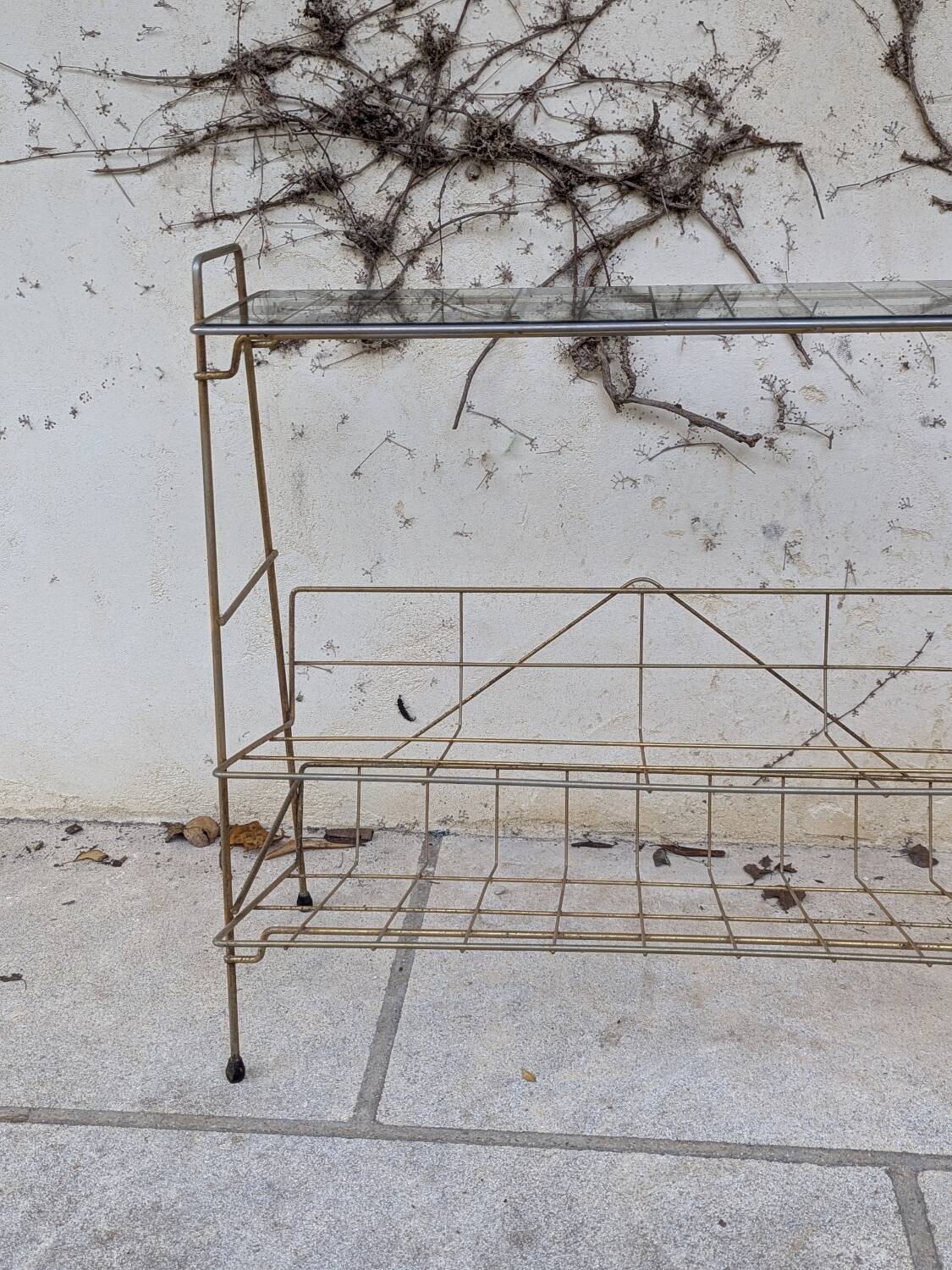 Gold metal magazine rack
