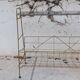 Gold metal magazine rack