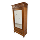 Armoire ancienne à miroir et décors sculptés