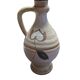 Handcrafted jug or jar with a handle, terracotta pottery vase, fat lava effect, stylized flowers