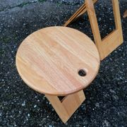 Lot table and folding stools Suzy by Adrian Reed.