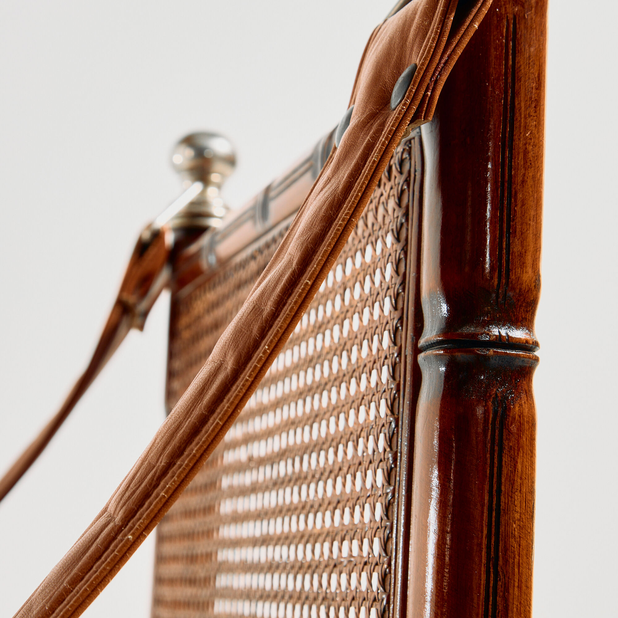 Walnut armchair with bamboo design