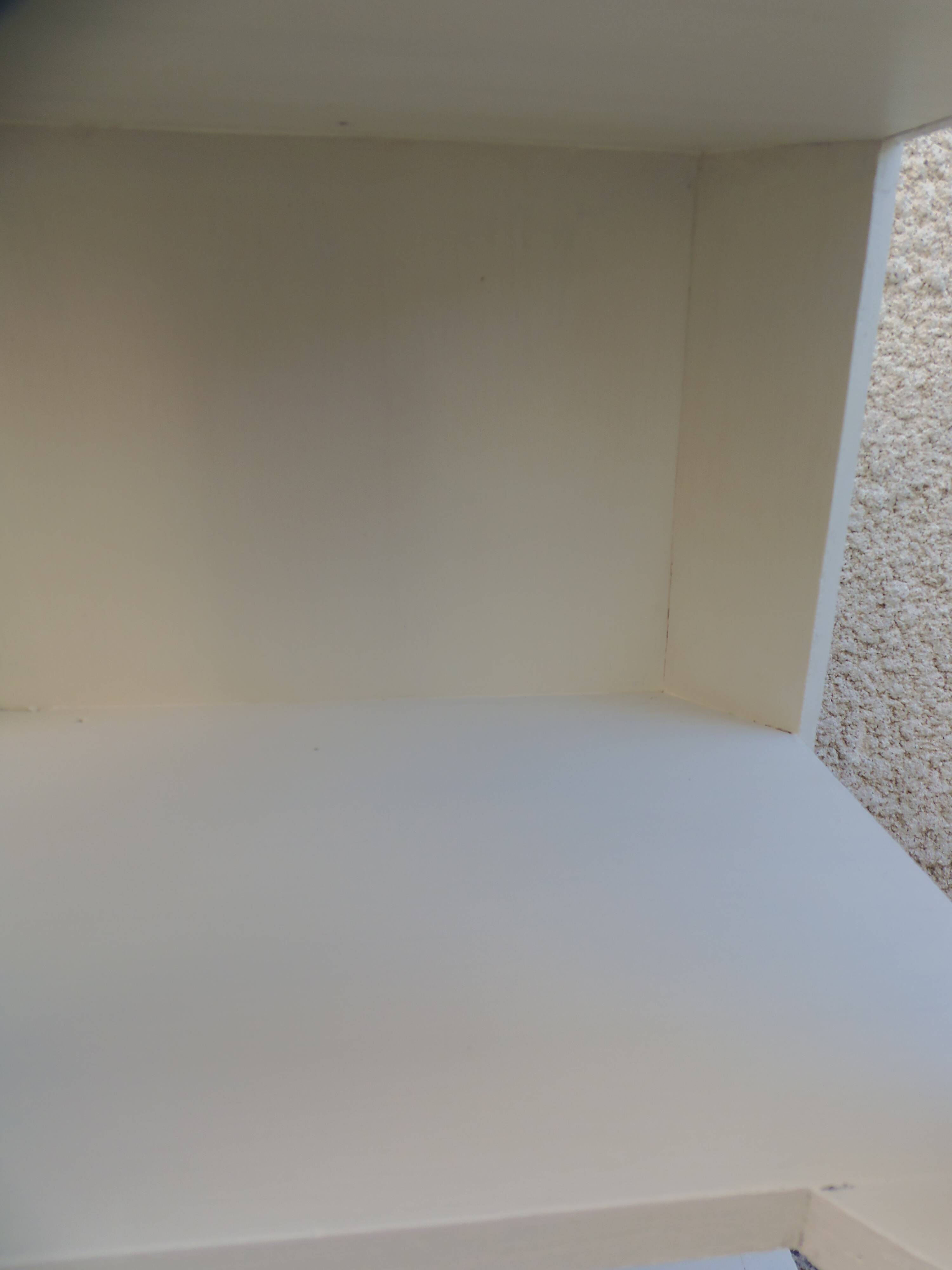 Beige vintage side tables, wooden tops.