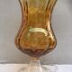 Ancient vase on foot orange glass