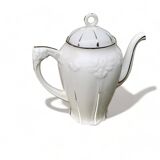 Porcelain coffee pot with floral pattern and silver stem