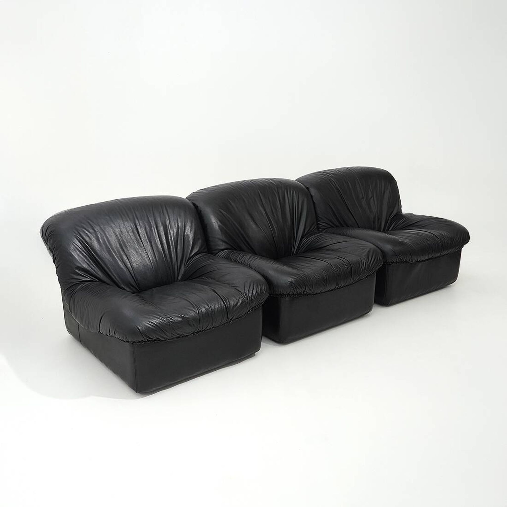 Modular black leather armchairs, 1970s