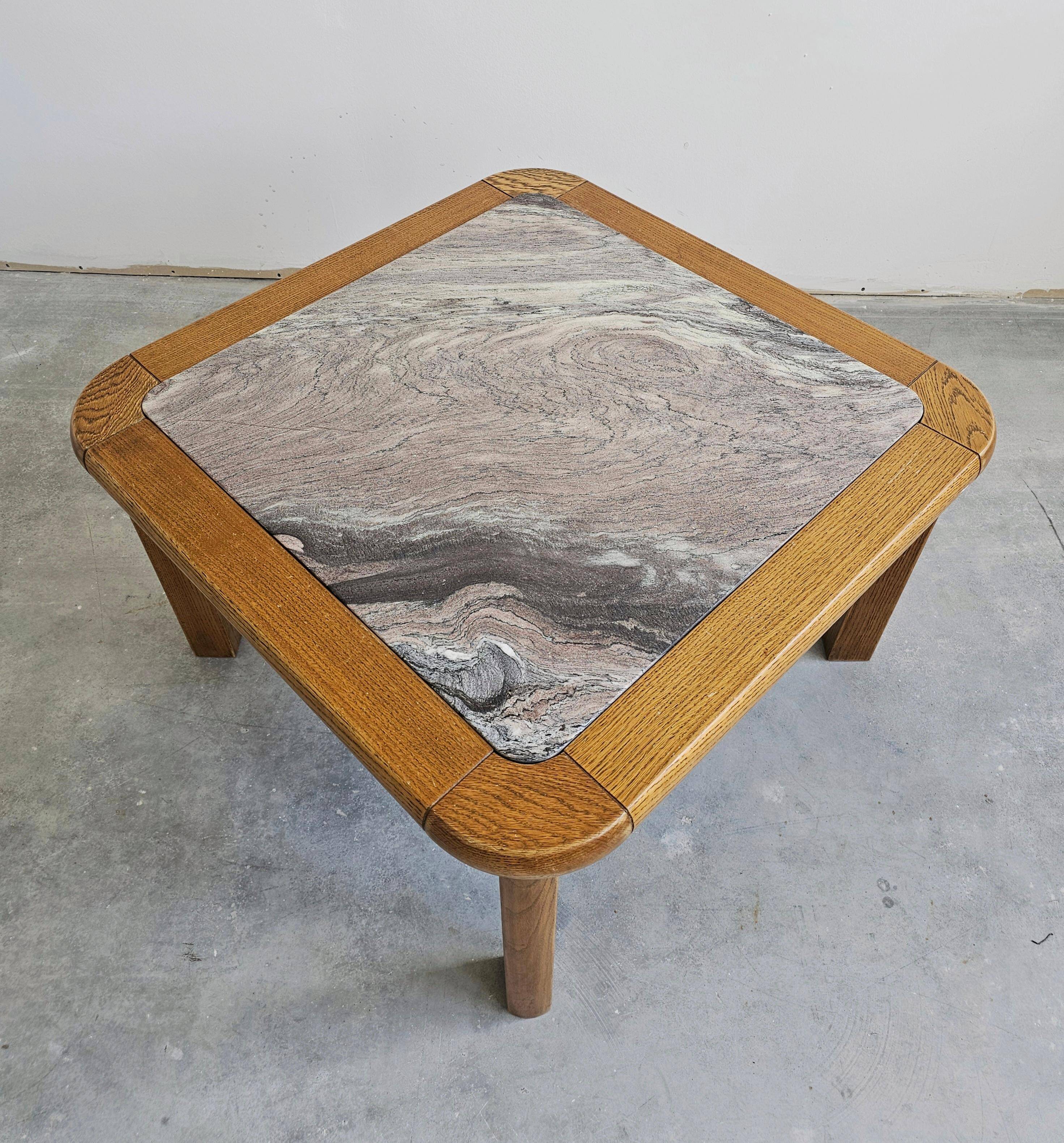 Brutalist coffee table in solid oak with a Rosso Luana marble top.