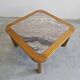 Brutalist coffee table in solid oak with a Rosso Luana marble top.