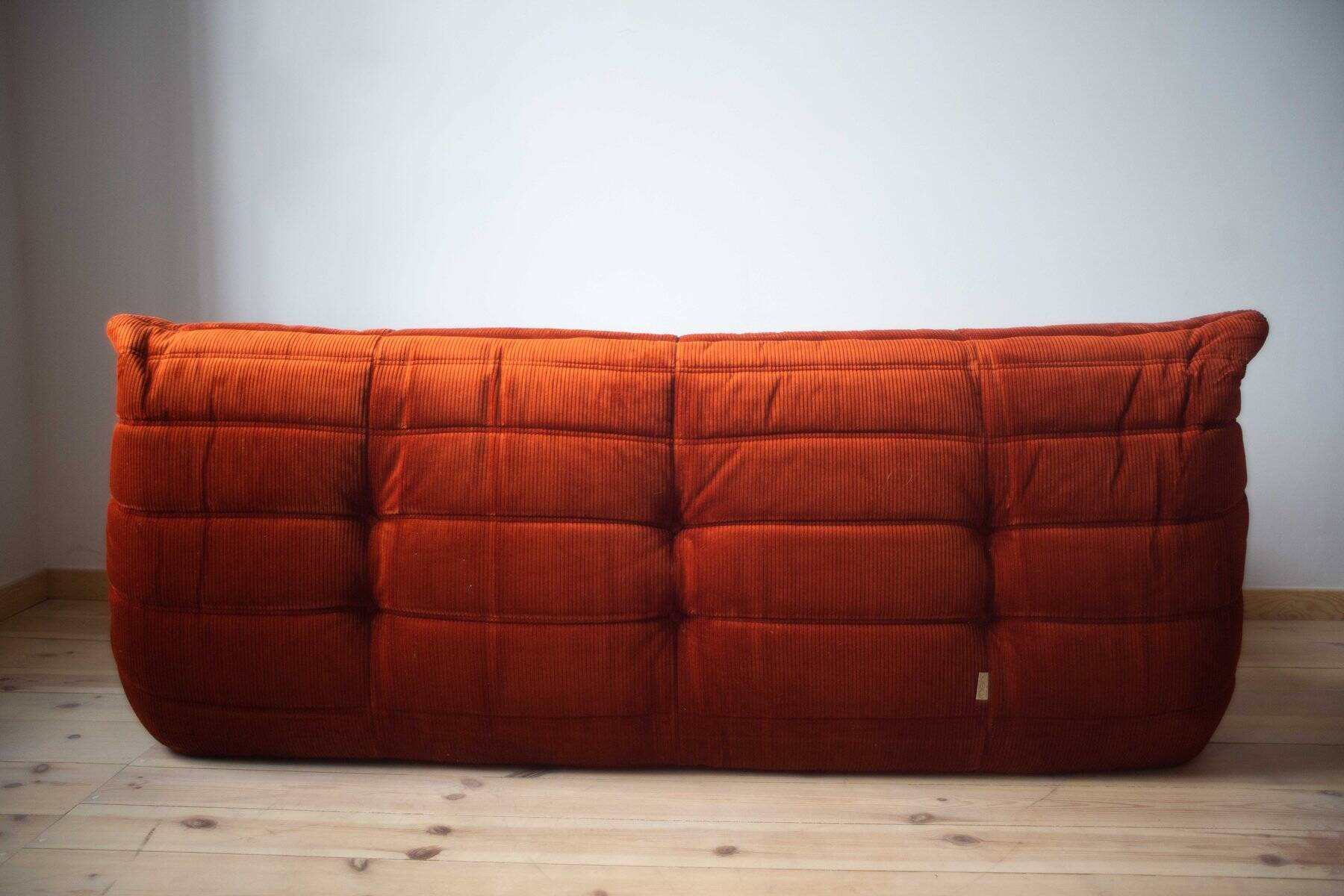 Amber corduroy Togo lounge chair with pouf and three-seat sofa by Michel Ducaroy for Ligne Roset, set of 3