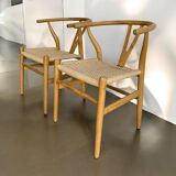 2 teak and rope dining chairs
