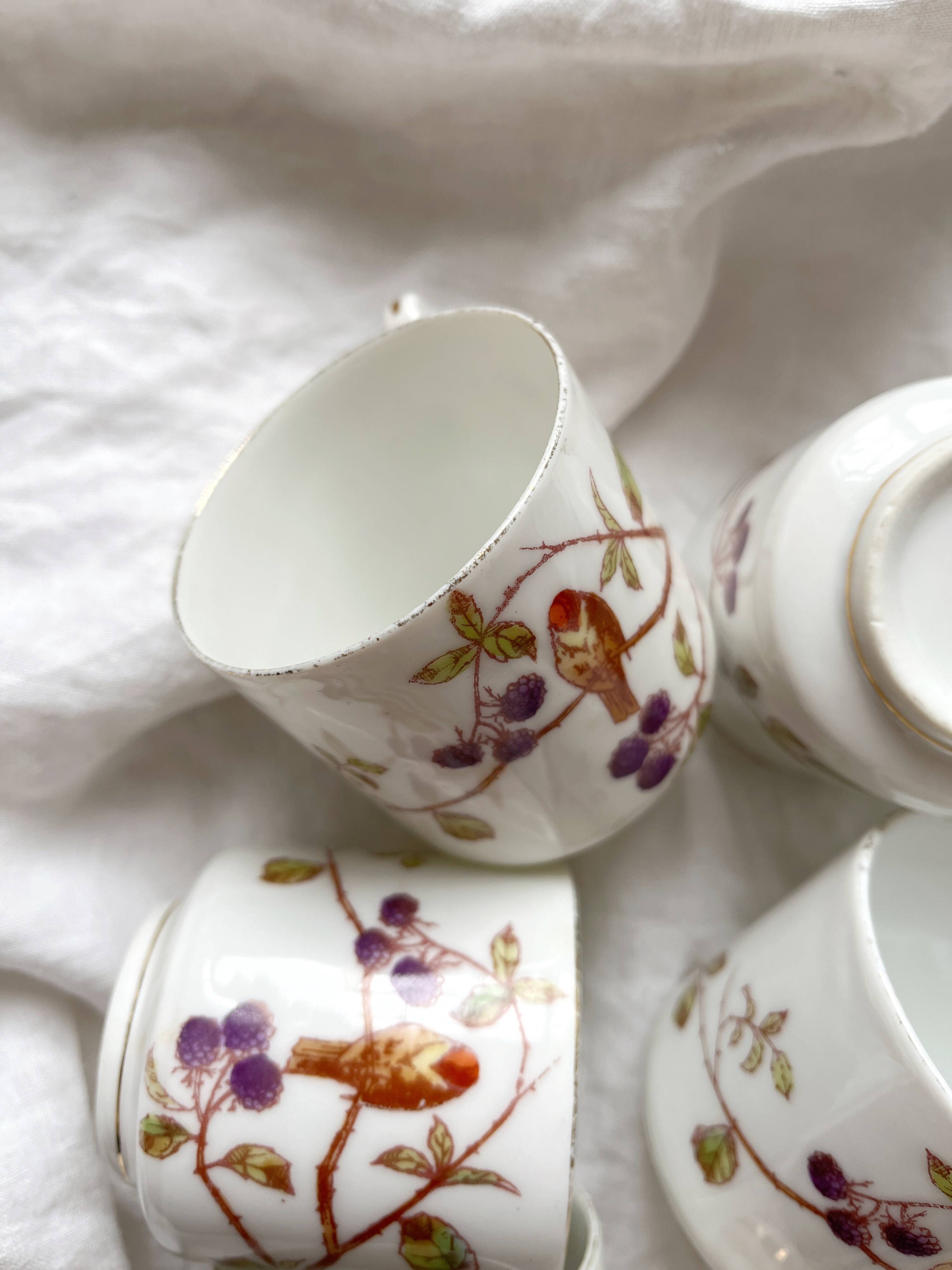 5 antique porcelain coffee cups decorated with birds