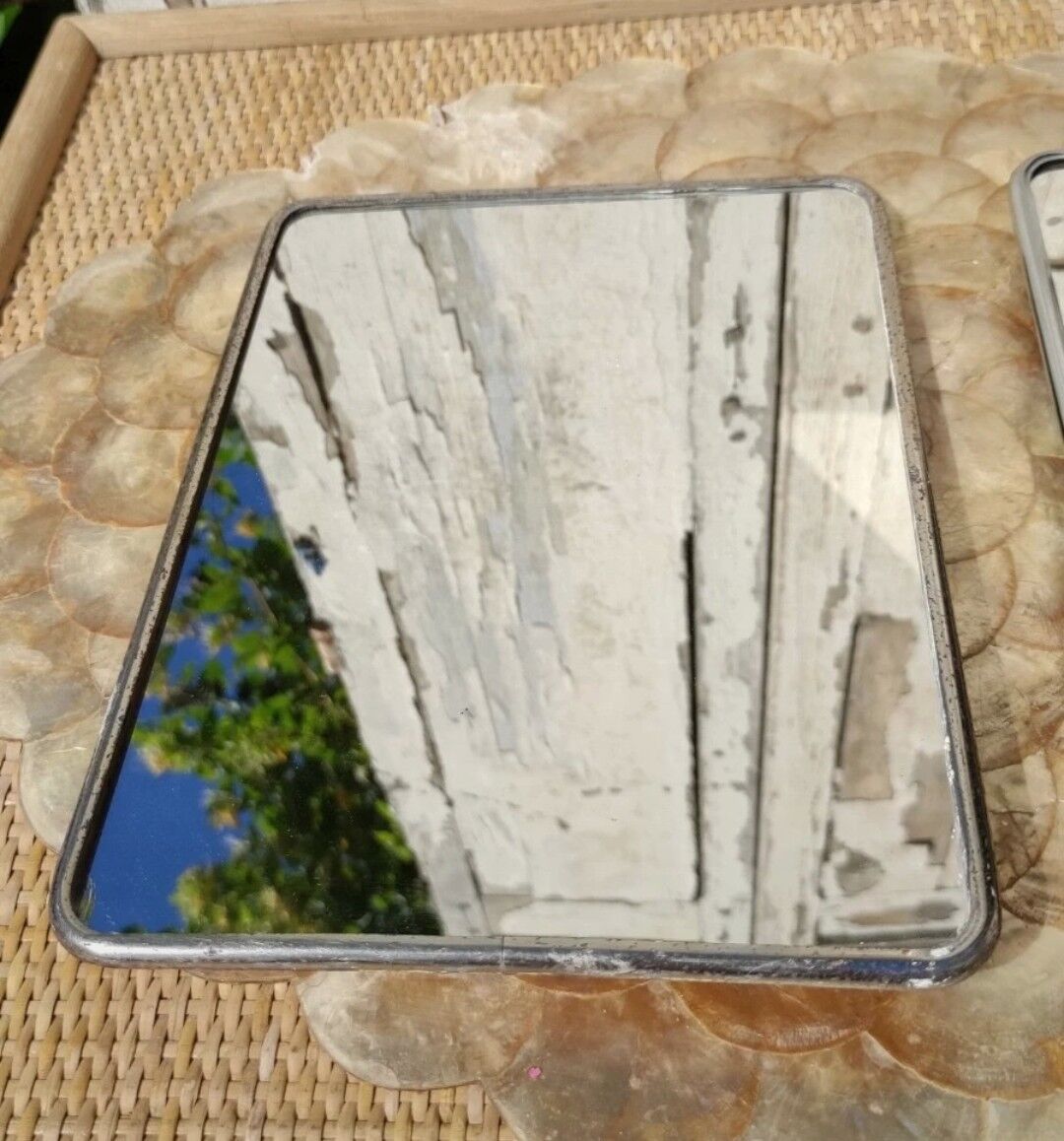 Duo of barber mirrors to pose