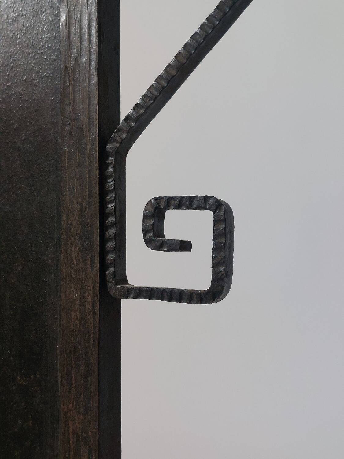 Hand-forged spiral decorative fire surround.