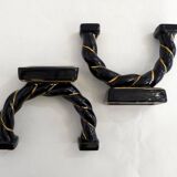 Pair of earthenware braided rope candlesticks