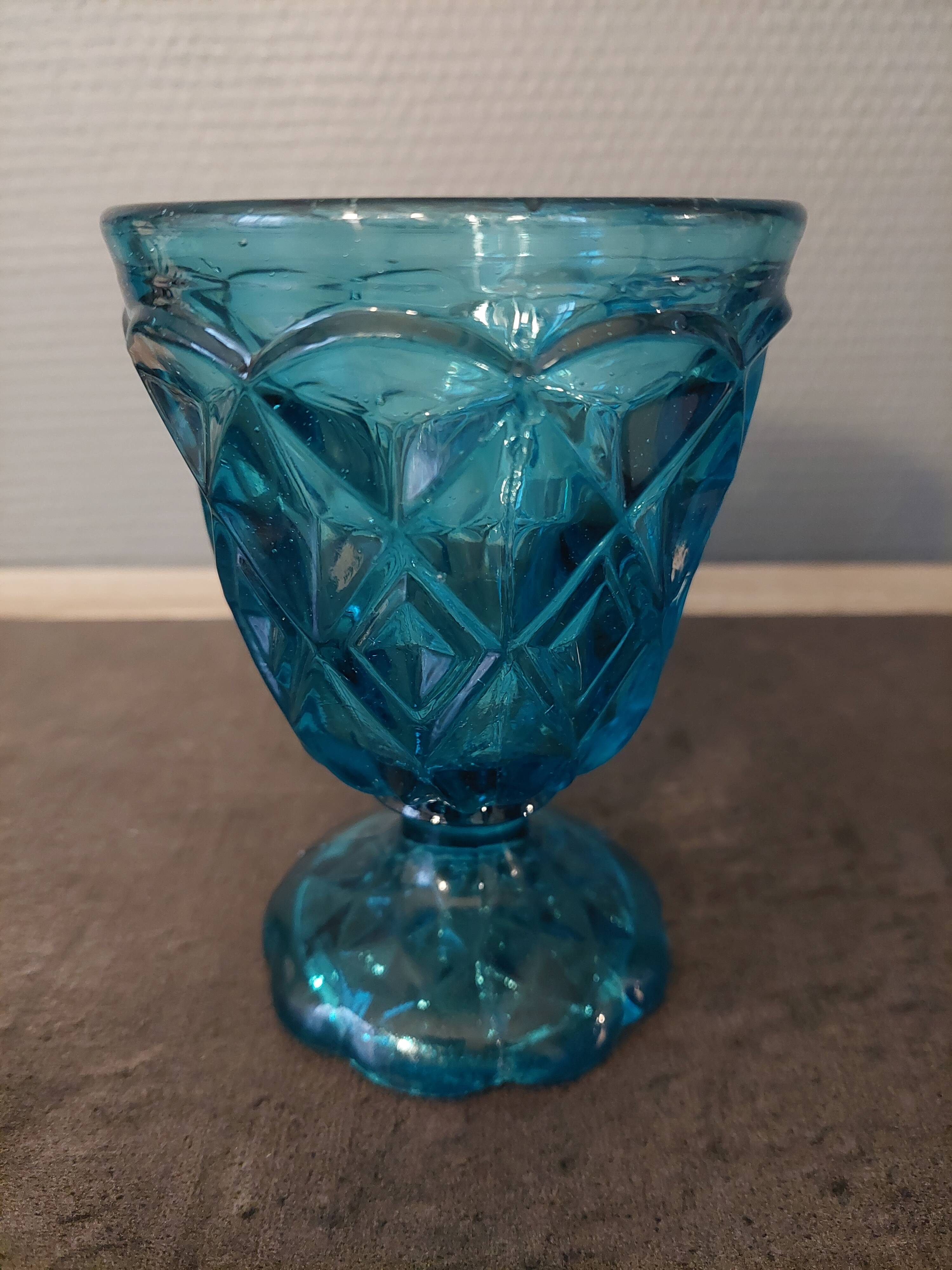 Turquoise molded glass foot glass