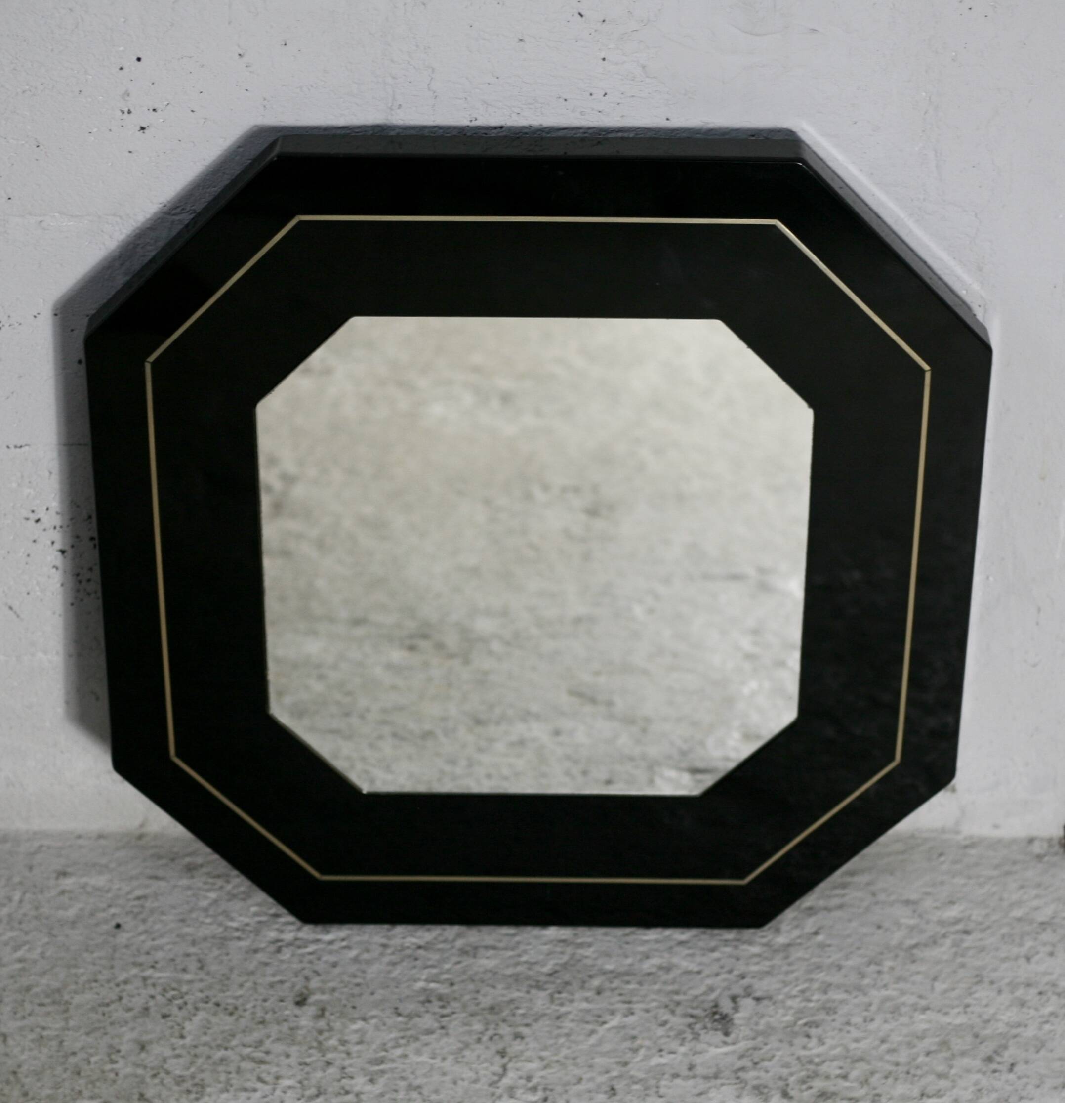 70s mirror, black lacquered wood, brass edging. Octagonal