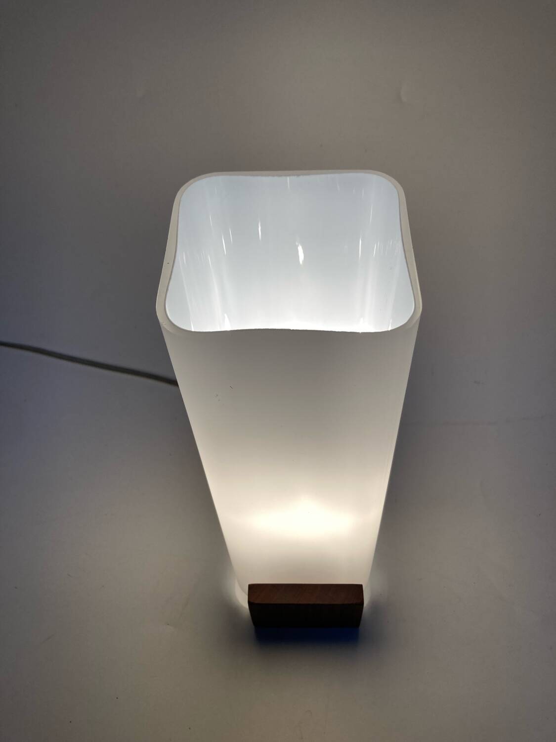 Many Louis Kallf wall lights.