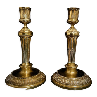 Pair of Louis XVI torches in gilded bronze