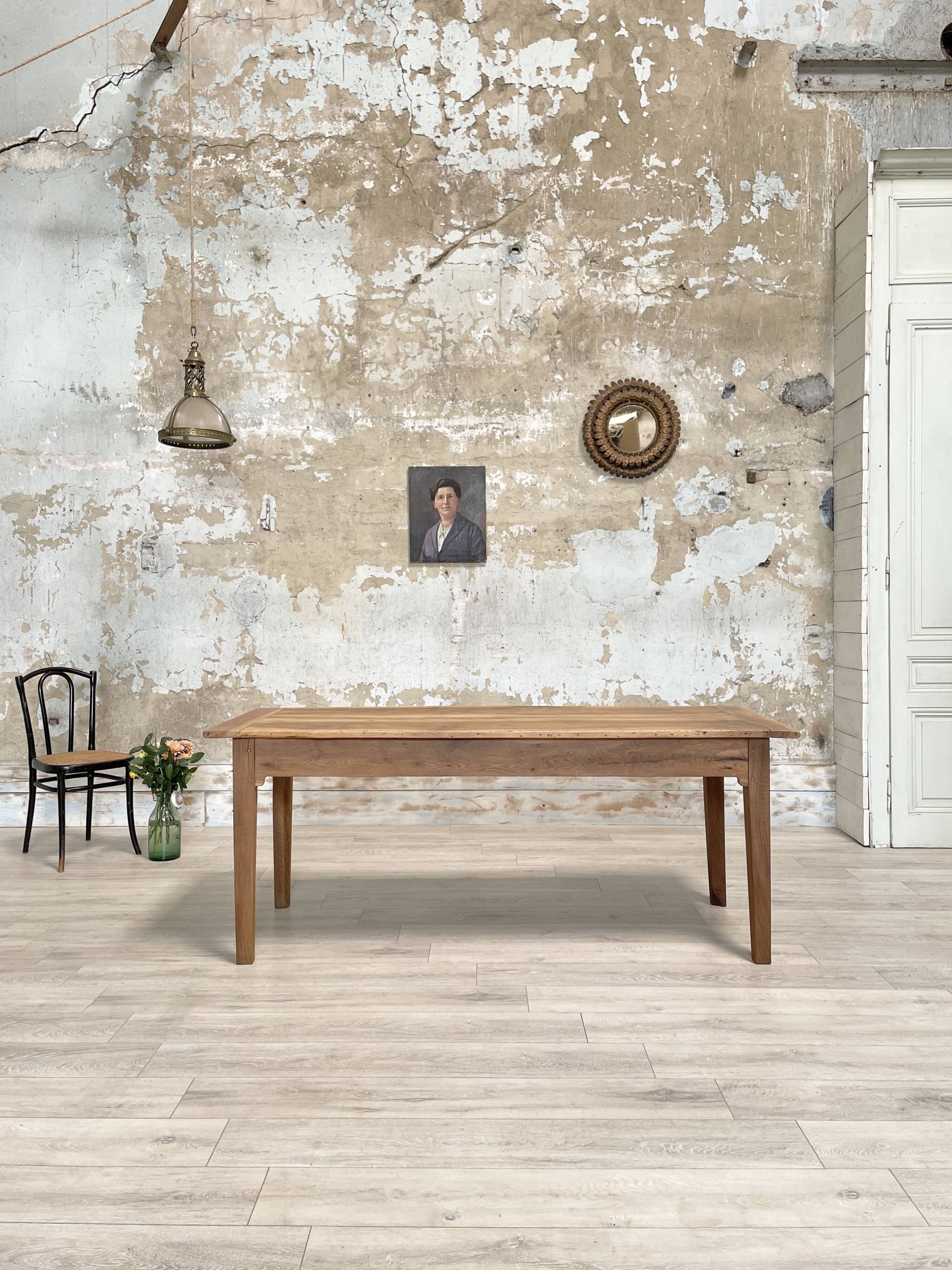 Vintage farmhouse table with spindle legs.