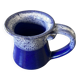 Small enamelled earthenware milk jug