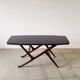 1950s Ilse Möbel coffee table with a black glass top.