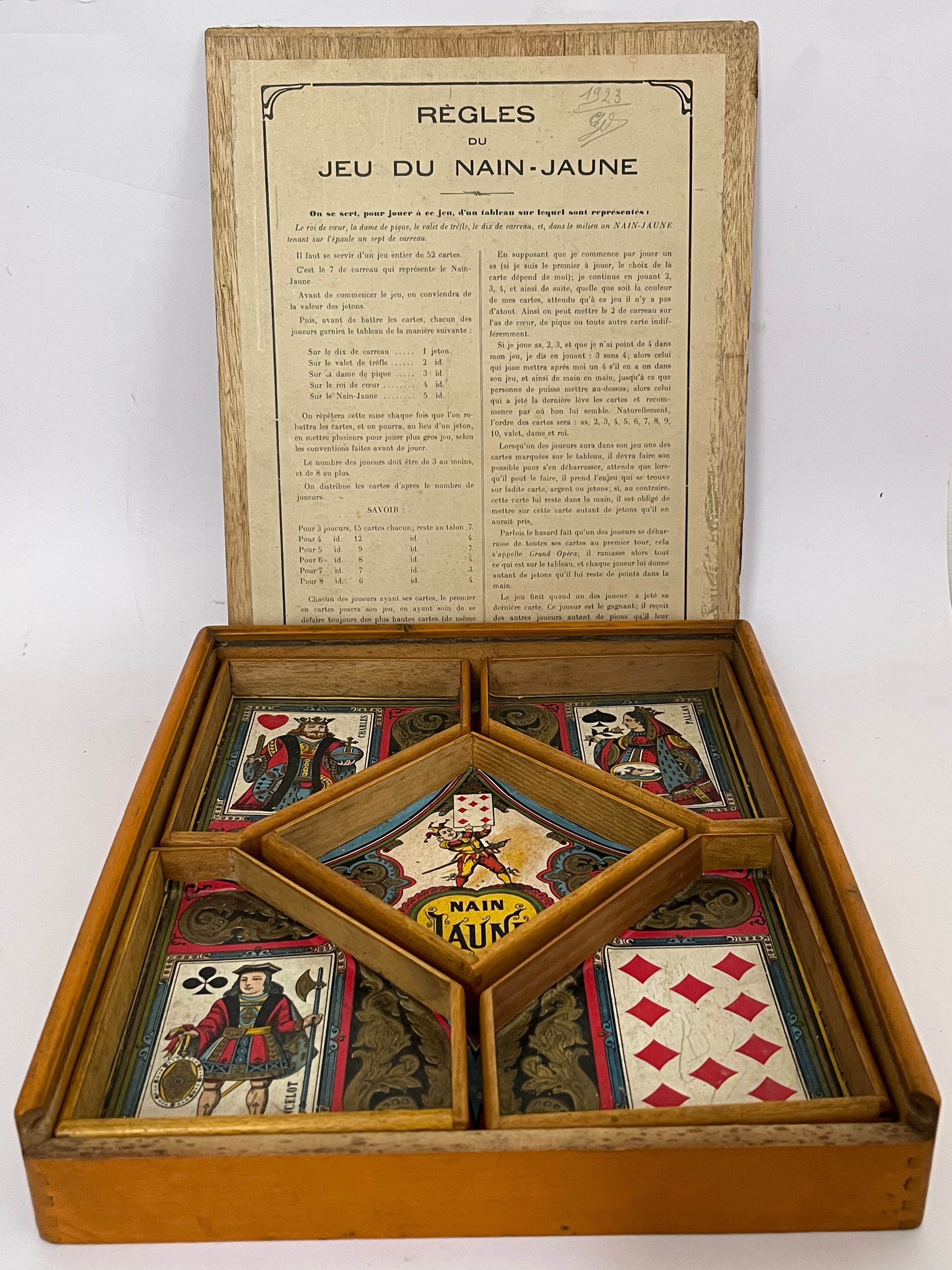Old game of nain jaune with its bone tokens.