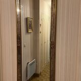 Mirror with a glazing bar