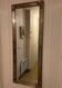 Mirror with a frame