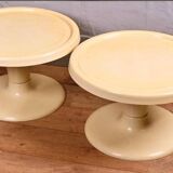 Set of two circular cream plastic sofa ends, 60s/70s