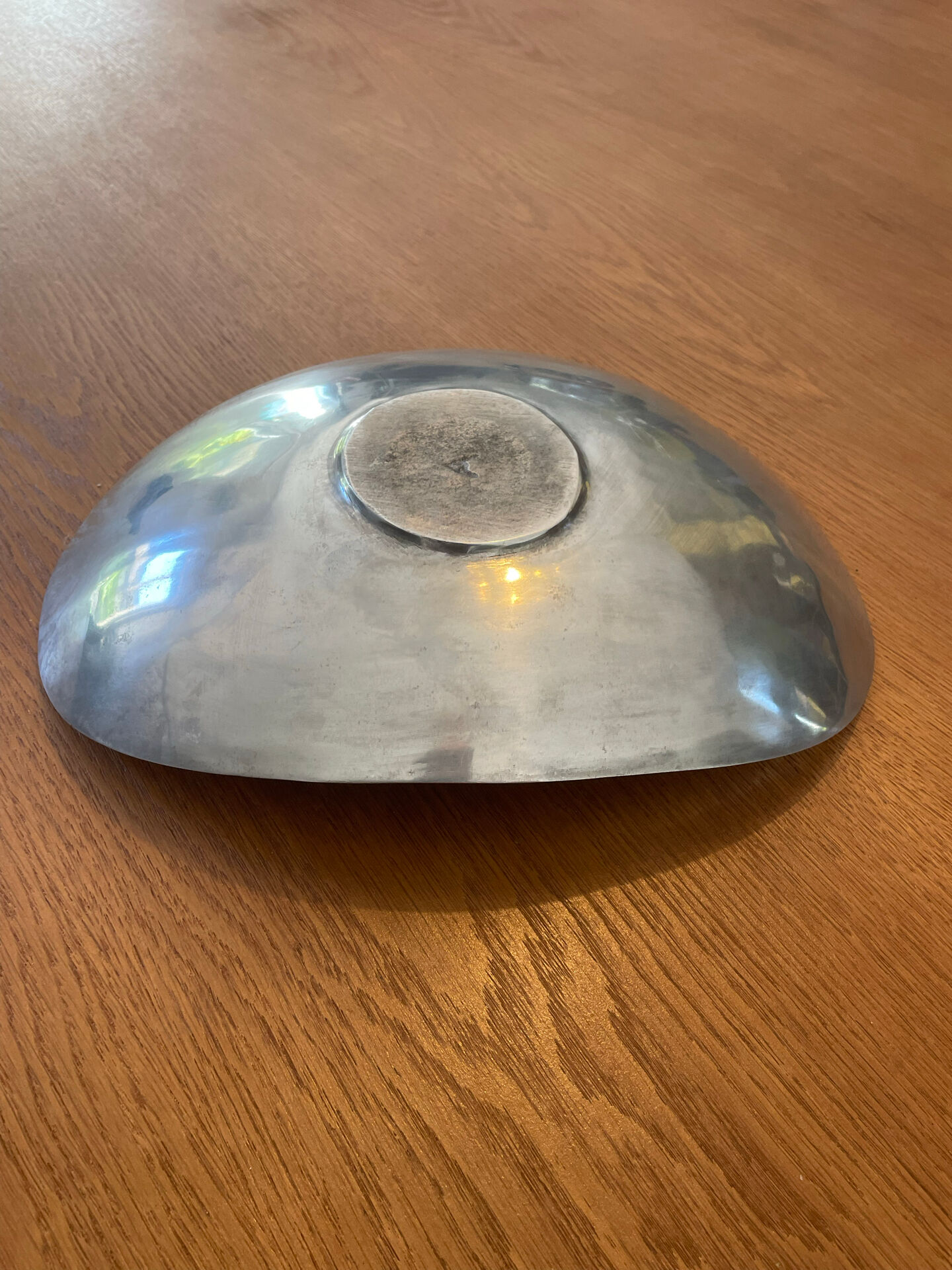 Elegant forged aluminium catchall.