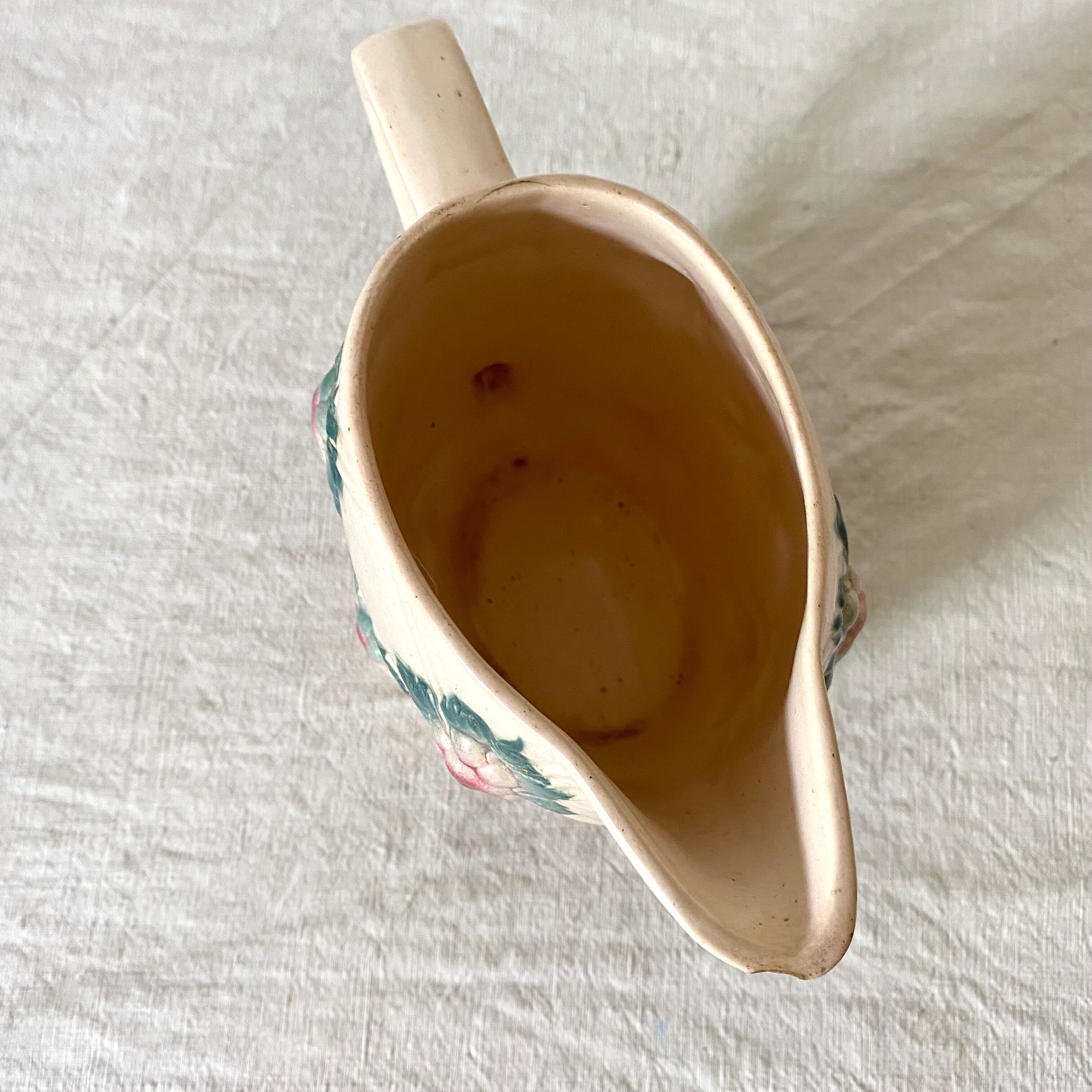 Antique pitcher in Digoin slip