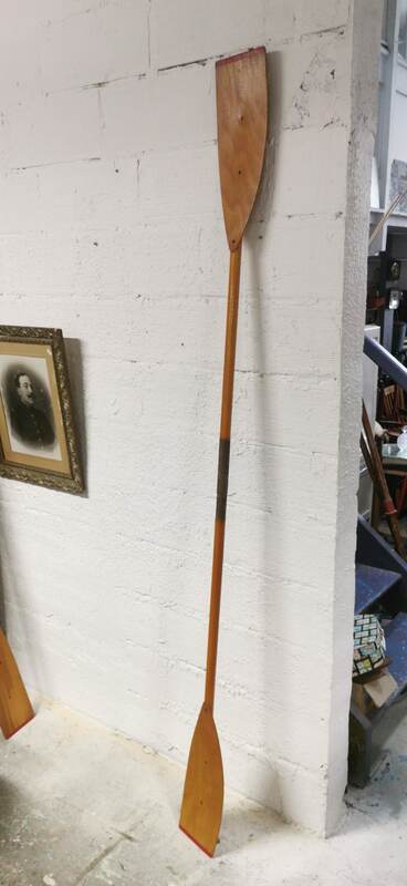 Pair of old wooden oars