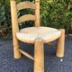 Chaise basse bois et paille années 50