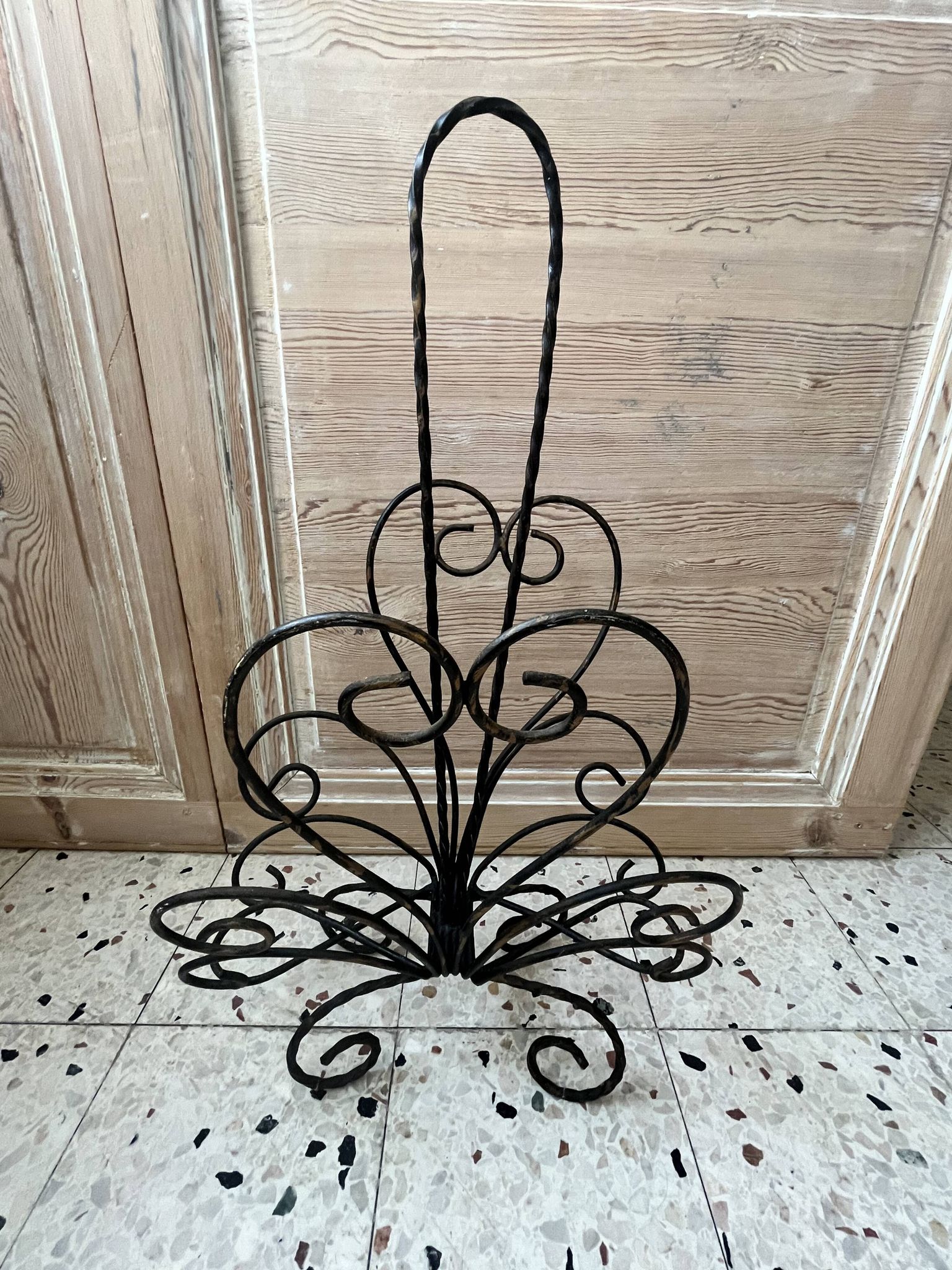 Wrought iron magazine rack