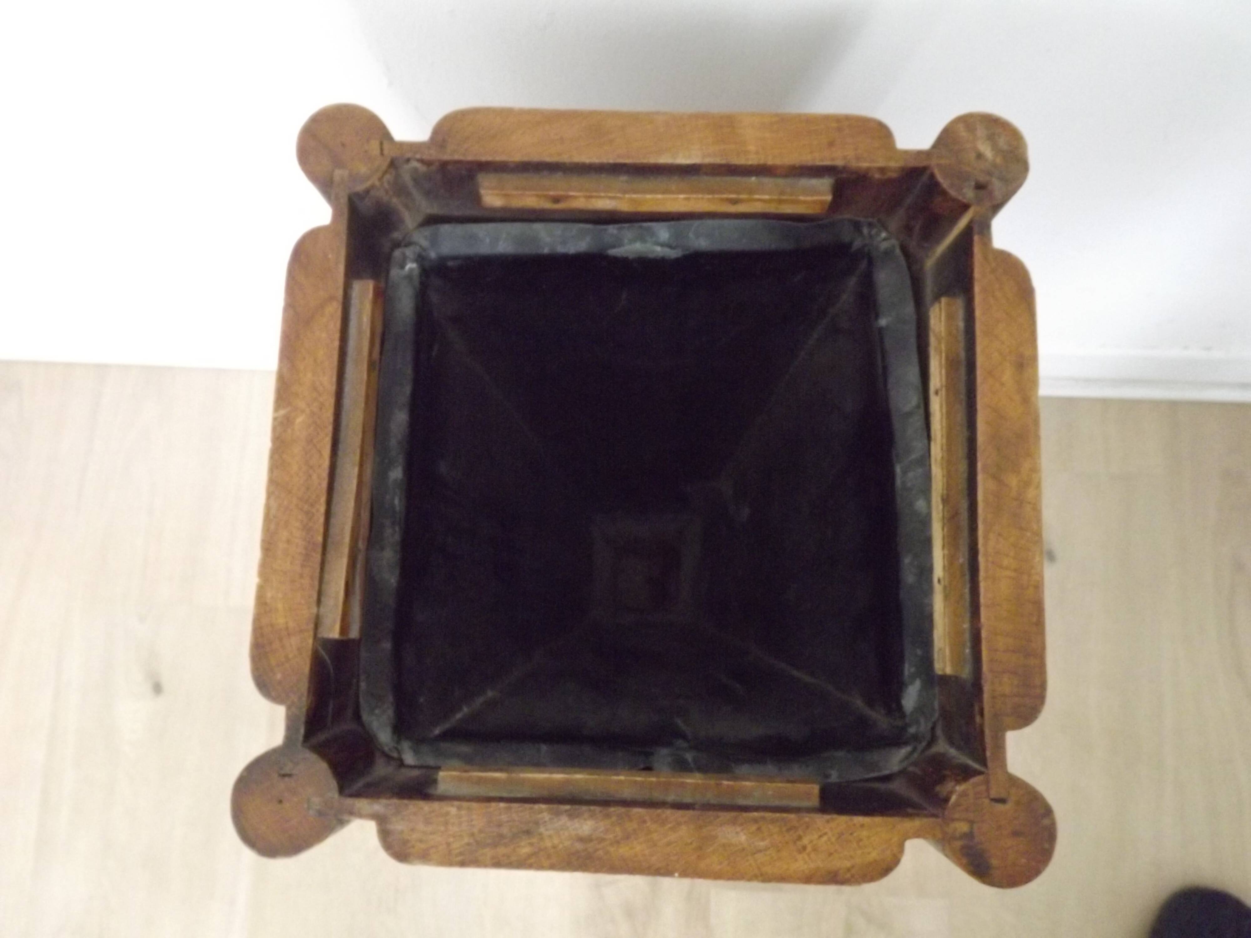 French antique oak tin-lined hand-carved umbrella stand with flower decoration.