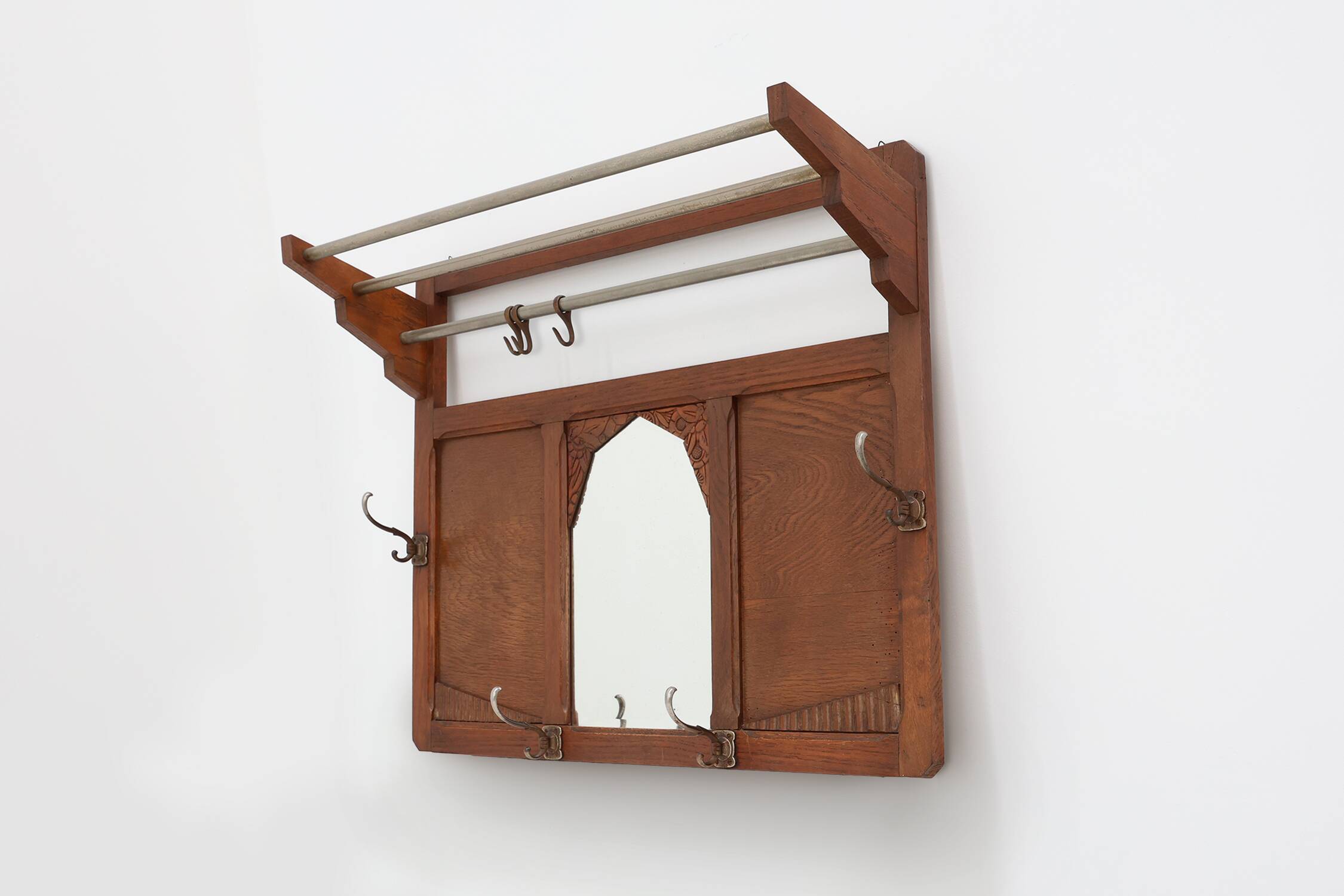 Art Deco oak carved wall coatrack with mirror, France 1920s