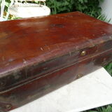 Old monogrammed leather travel suitcase and barony crown
