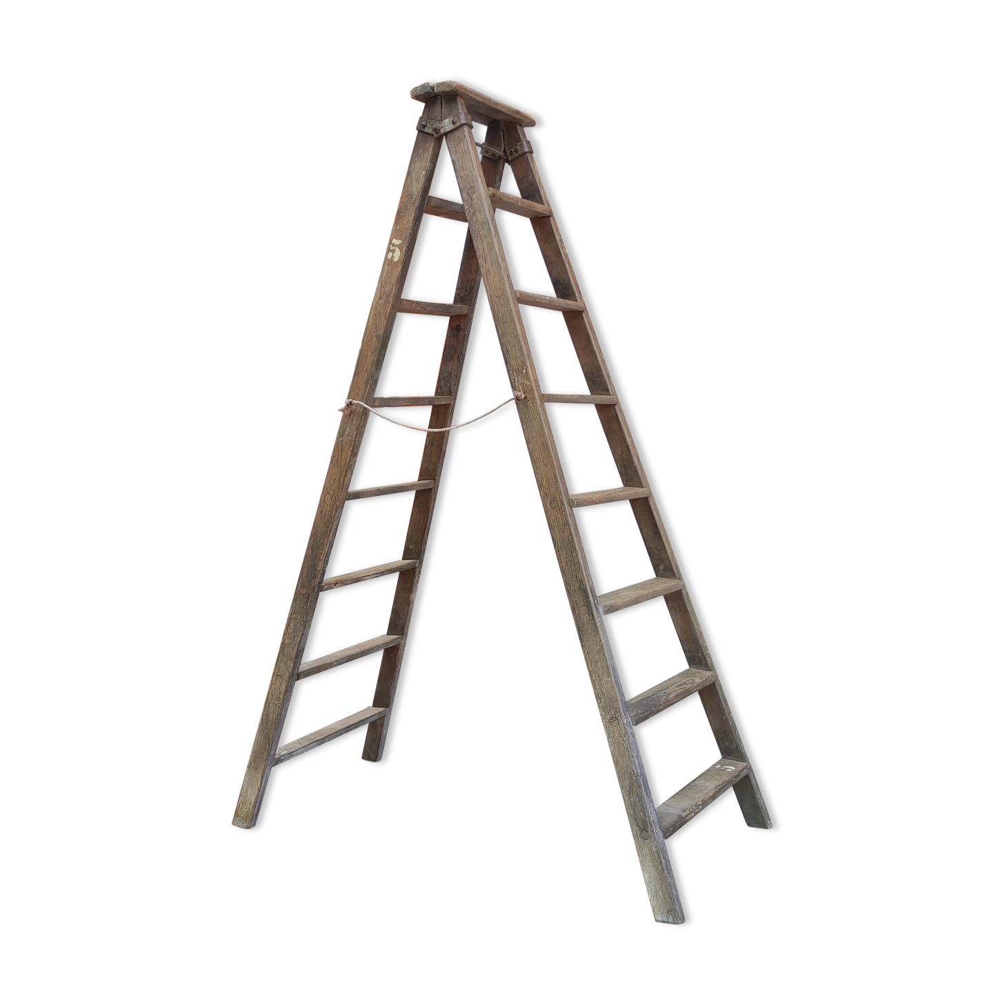 Old wooden stepladder stamped