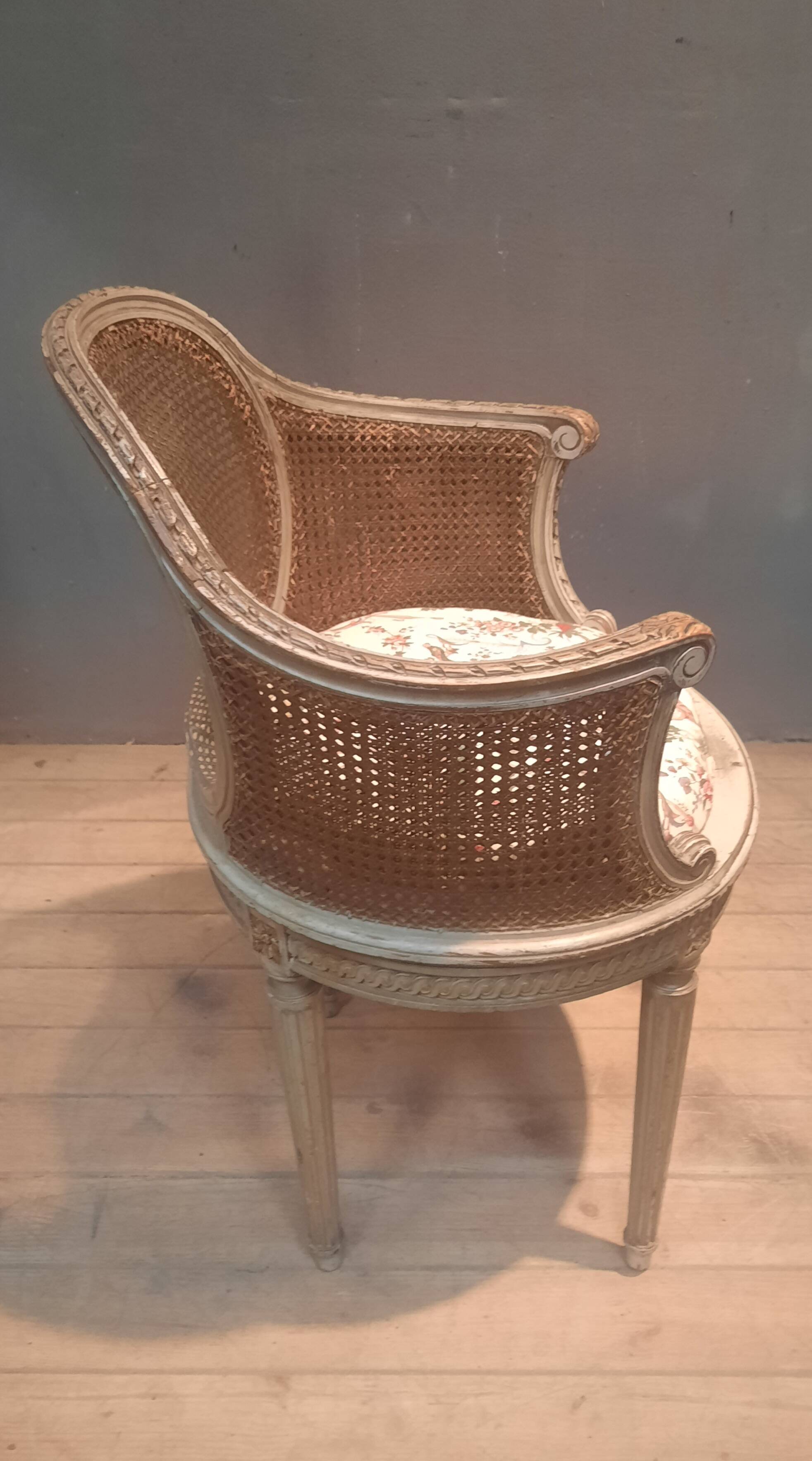 Caned armchair in Louis XVI style
