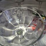 Beautiful set of seven crystal champagne glasses engraved with vine branches