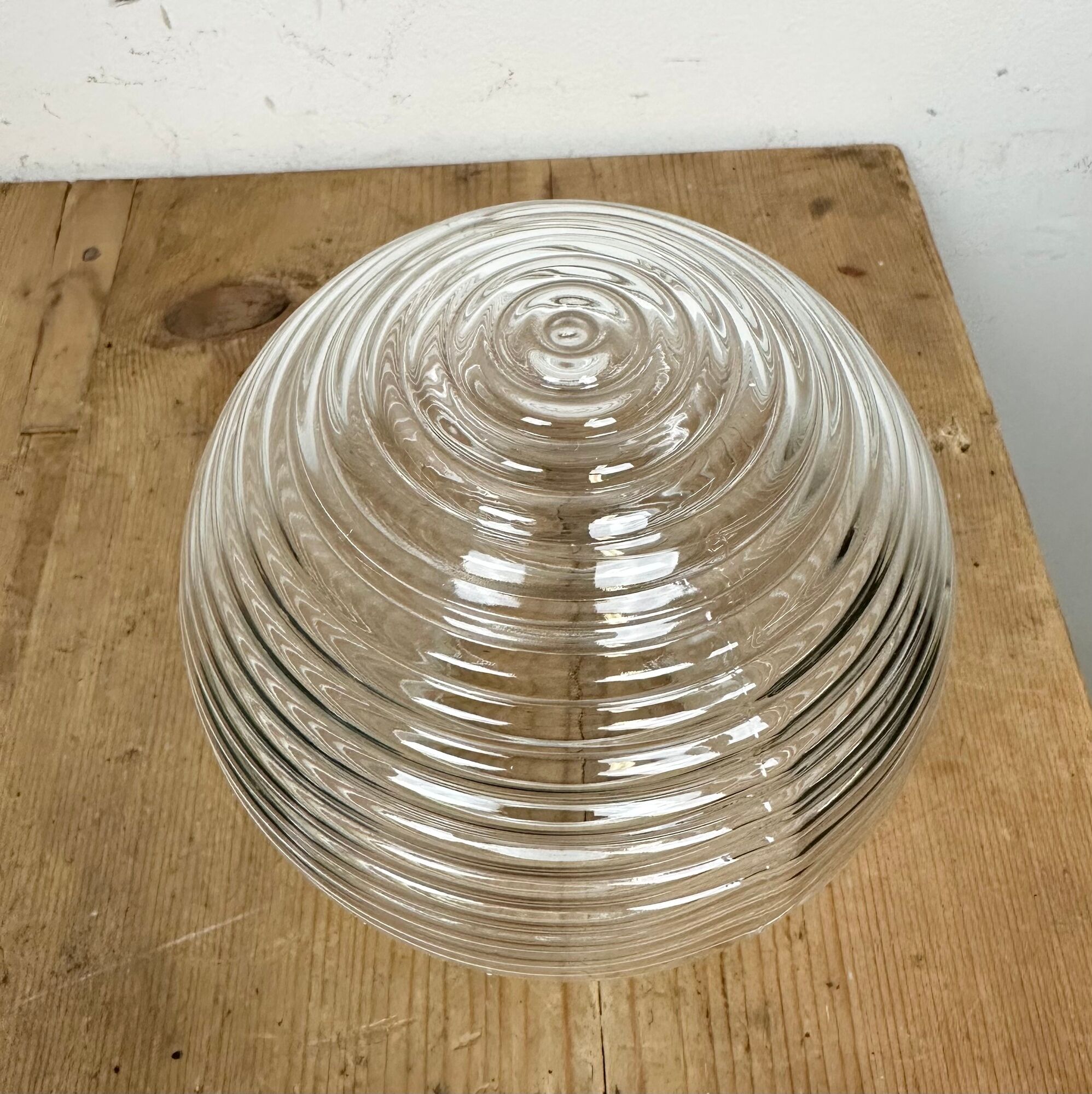 Industrial porcelain red enamel pendant light with ribbed clear glass, 1970s