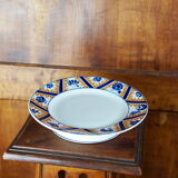 Plat à gâteau en faïence à motif de fleurs, nuages et flammes, orange et bleu - Orchies - 50s