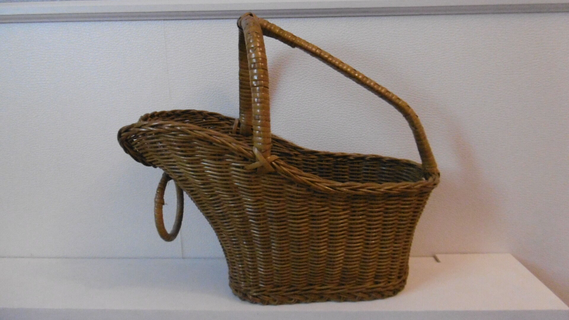 Old wicker bottle holder