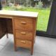 Small wooden desk three drawers