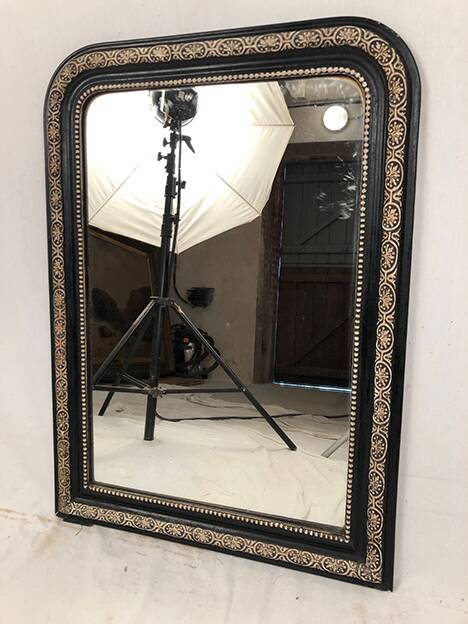 Napoleon III curved mirror, blackened wood frame with cream trim