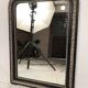 Napoleon III curved mirror, blackened wood frame with cream trim
