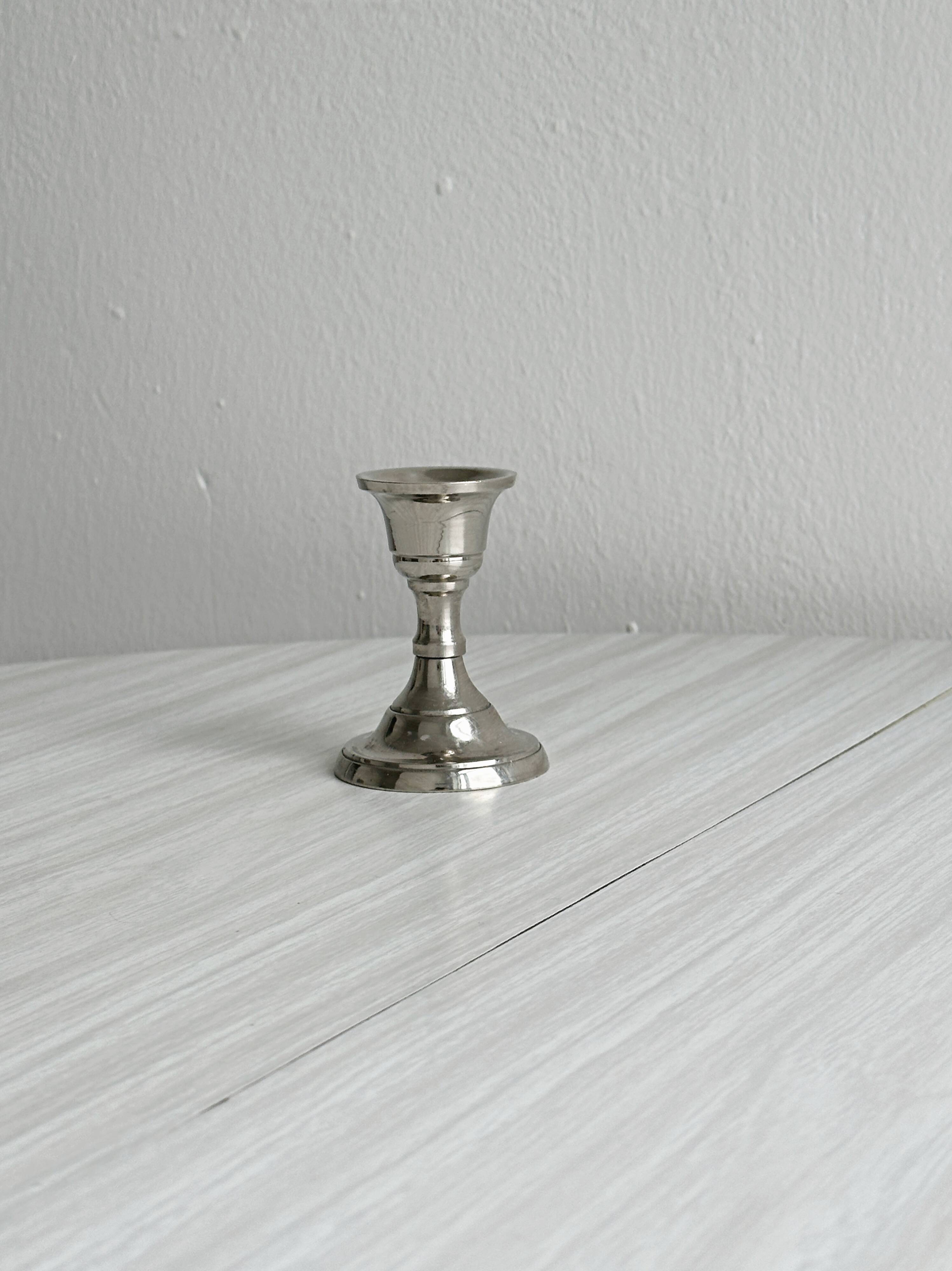 Small lightweight metal candlestick