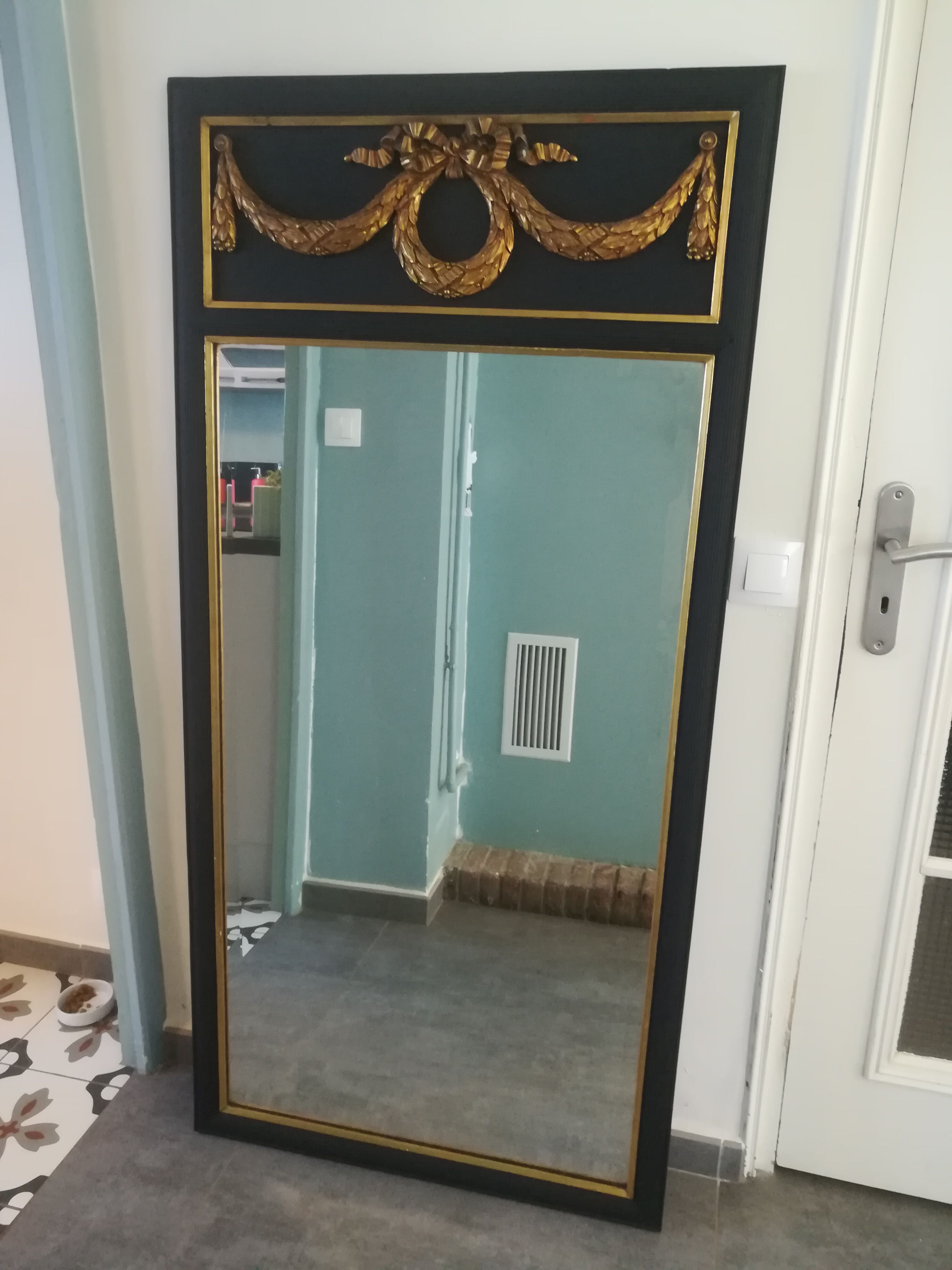 Trumeau louis XVI style mirror in black and gold stucco