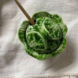 Small pot of cabbage leaf slip