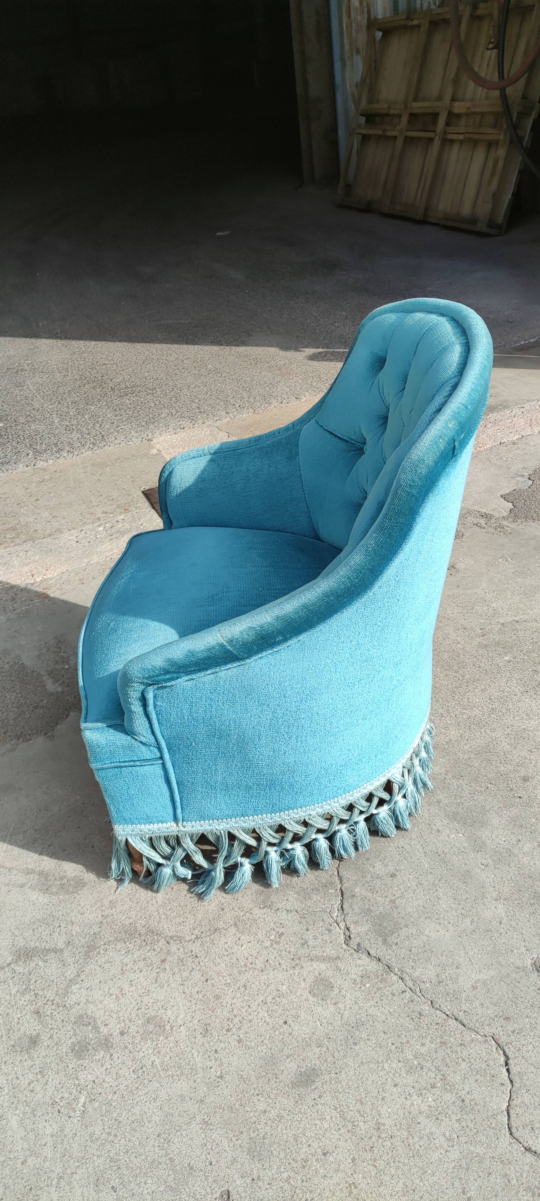 Blue velvet upholstered toad armchair